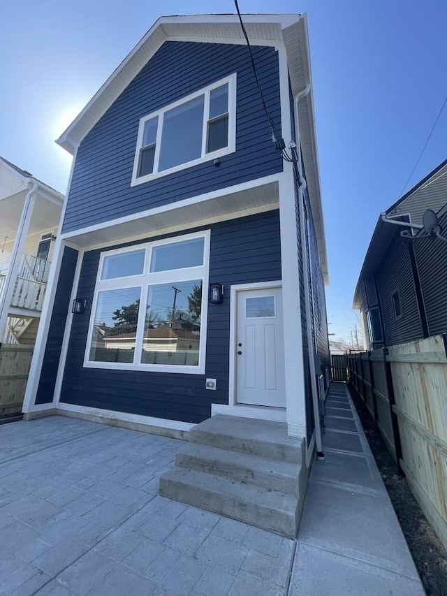 view of front of property with fence