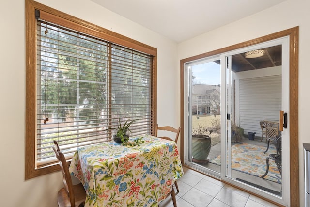 dining room featuring light tile patterned floors