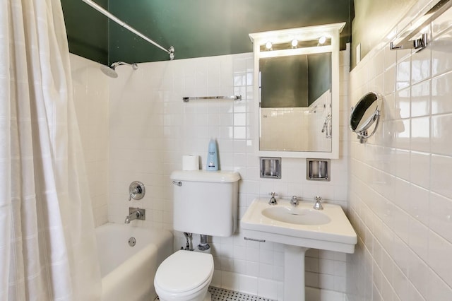 full bathroom featuring shower / bathtub combination with curtain, toilet, and tile walls