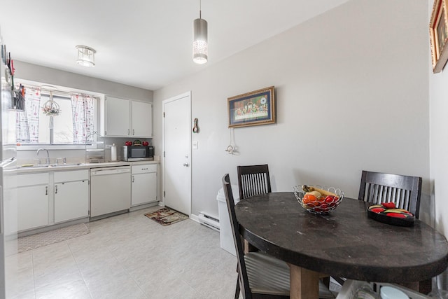 dining space with baseboard heating