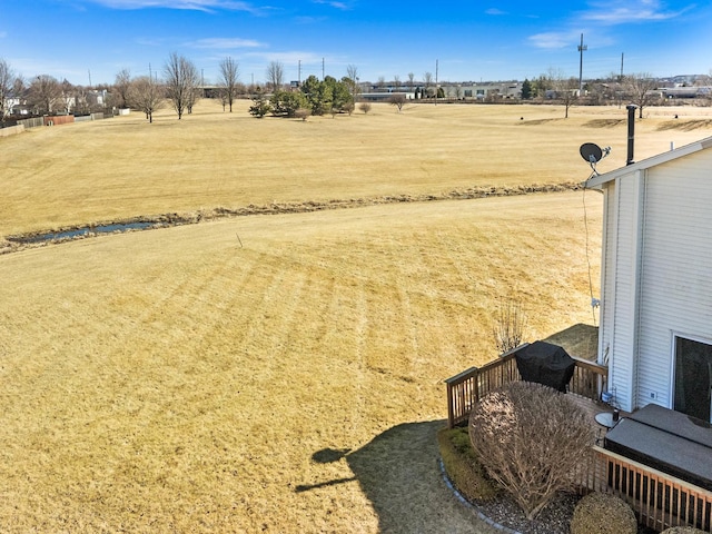 view of yard with a rural view