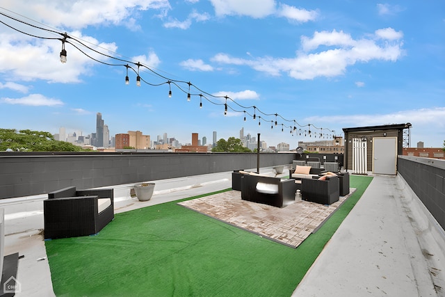 view of patio featuring a city view and an outdoor living space