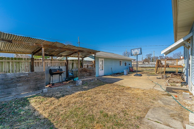 view of yard featuring a patio area and fence