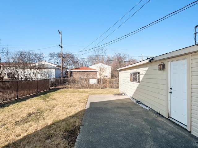 view of yard featuring a patio and fence