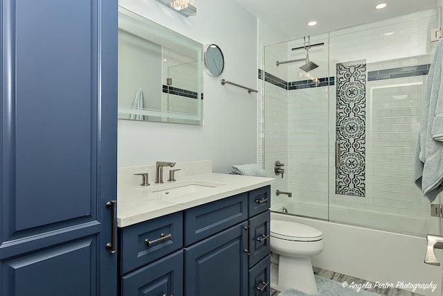 full bath featuring vanity, toilet, recessed lighting, and shower / bath combination