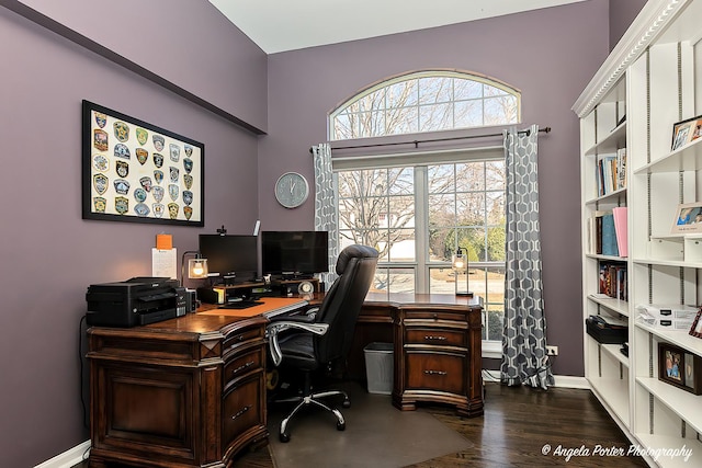 office space with baseboards and dark wood-style flooring