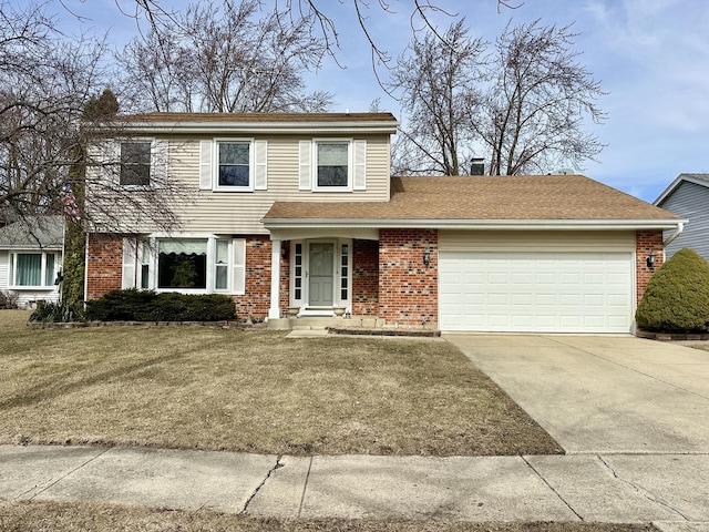 traditional-style home with brick siding, driveway, a front lawn, and a garage