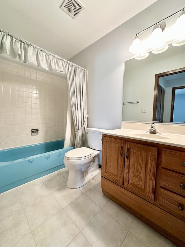 bathroom featuring vanity, visible vents, tile patterned flooring, toilet, and shower / tub combo with curtain