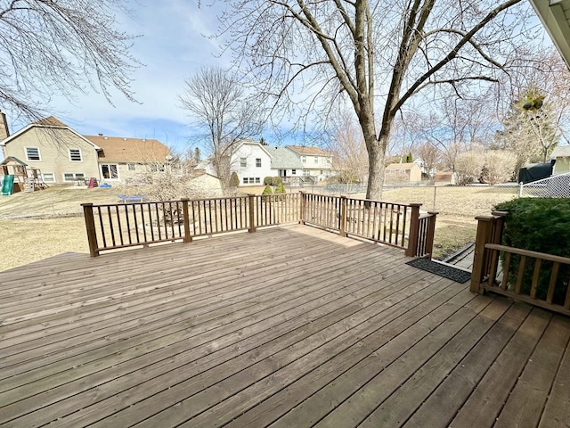 wooden deck featuring a residential view