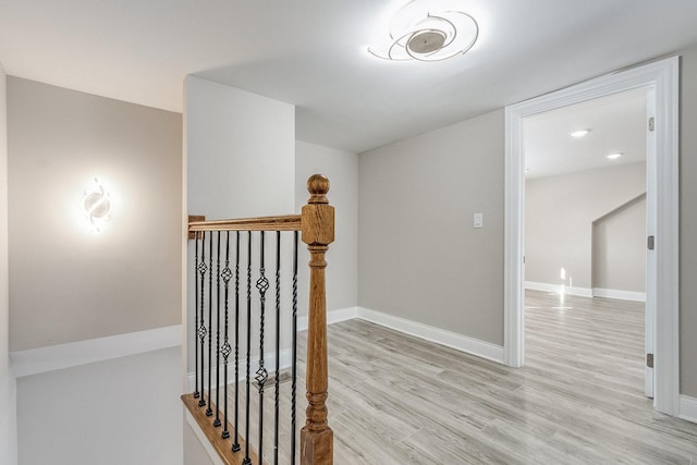 12533 S Lowe Ave, Chicago, IL 60628 - corridor with an upstairs landing, light wood-style flooring, and baseboards