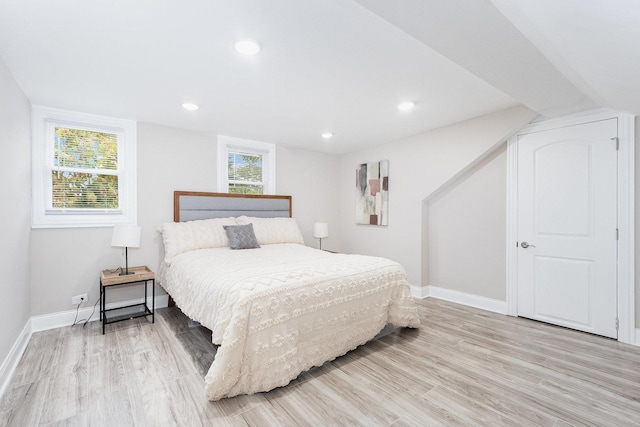 12533 S Lowe Ave, Chicago, IL 60628 - bedroom with light wood finished floors, baseboards, and recessed lighting