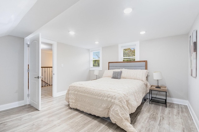 12533 S Lowe Ave, Chicago, IL 60628 - bedroom with light wood-style floors, baseboards, and recessed lighting