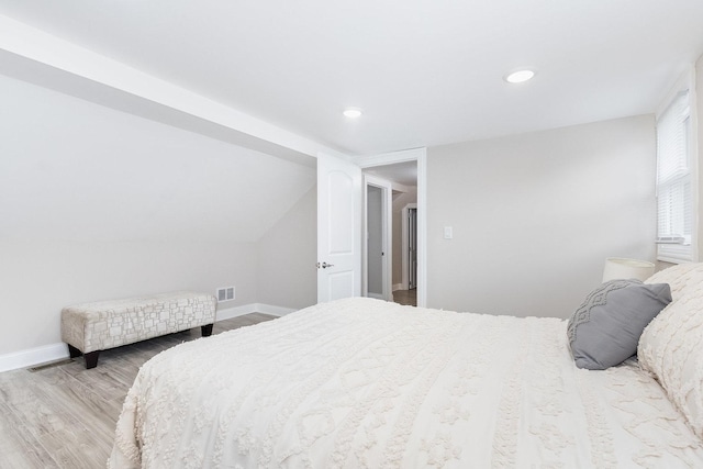 12533 S Lowe Ave, Chicago, IL 60628 - bedroom with wood finished floors, baseboards, recessed lighting, and vaulted ceiling