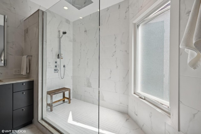 full bathroom featuring recessed lighting, walk in shower, and vanity