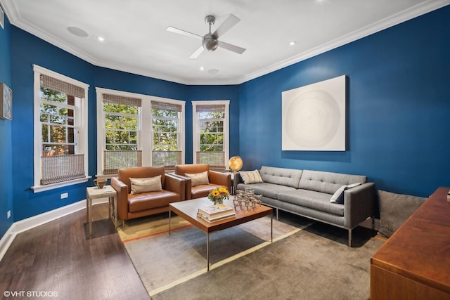 living room with ceiling fan, baseboards, wood finished floors, and crown molding