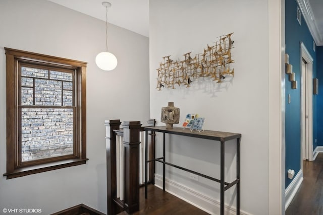 hallway featuring visible vents, baseboards, and dark wood-style floors