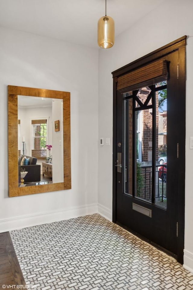 entrance foyer with baseboards