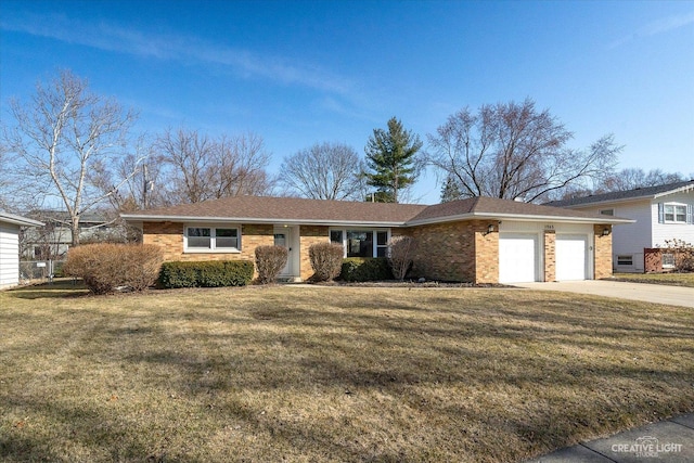 ranch-style home featuring a front lawn, an attached garage, brick siding, and driveway