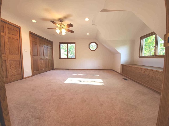 additional living space featuring vaulted ceiling, recessed lighting, baseboards, and carpet floors