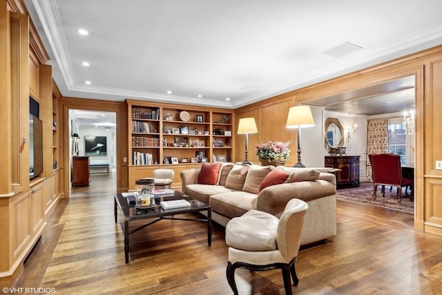 219 E Lake Shore Dr Unit 2Abc, Chicago, IL 60611 - living area featuring wood finished floors, ornamental molding, built in shelves, and recessed lighting