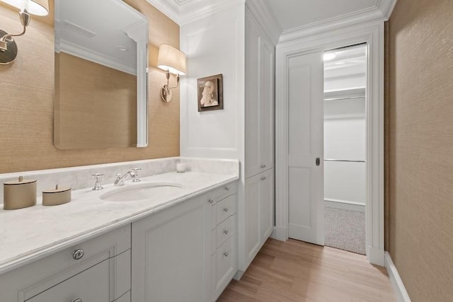 219 E Lake Shore Dr Unit 2Abc, Chicago, IL 60611 - bathroom featuring crown molding, wood finished floors, and vanity