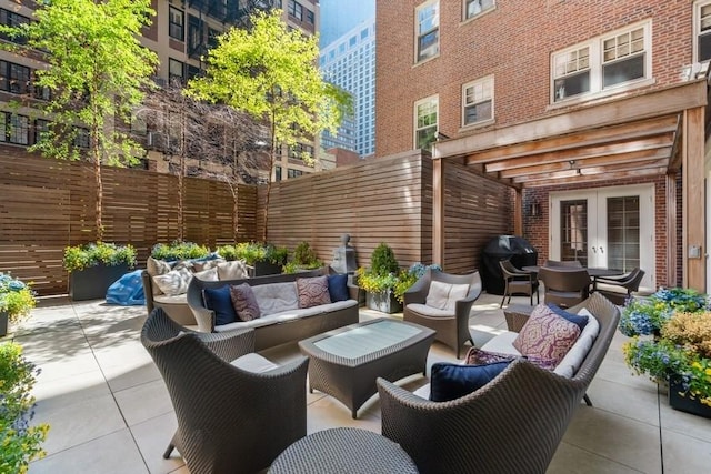 219 E Lake Shore Dr Unit 2Abc, Chicago, IL 60611 - fenced backyard featuring french doors, an outdoor hangout area, a patio, and grilling area