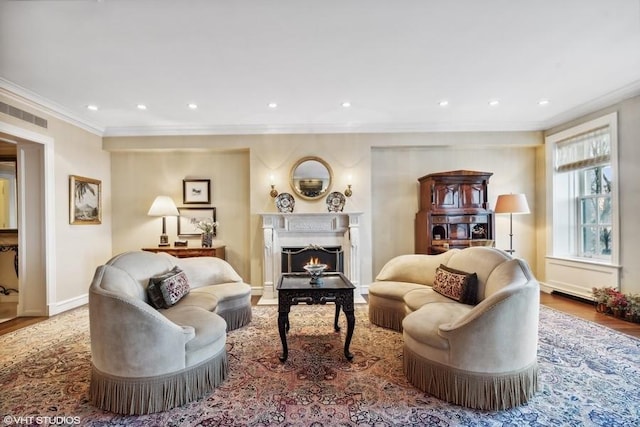 219 E Lake Shore Dr Unit 2Abc, Chicago, IL 60611 - living area featuring crown molding, recessed lighting, a warm lit fireplace, baseboards, and wood finished floors