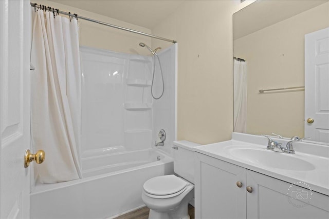 full bath with toilet, shower / bath combo, and vanity