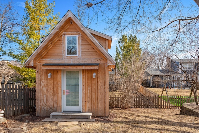 view of shed featuring a fenced backyard