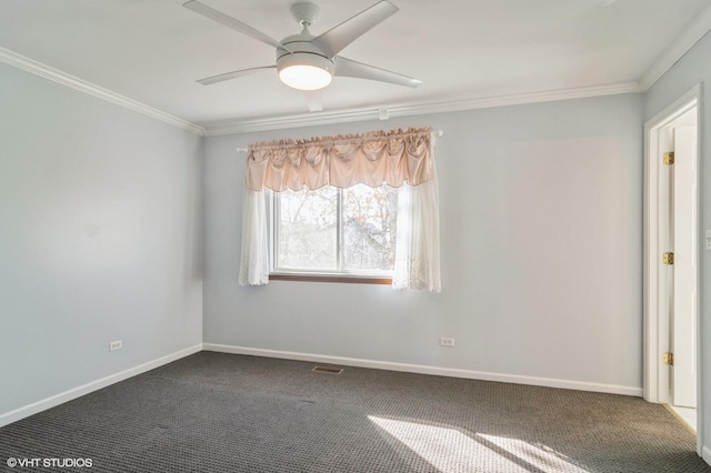 carpeted empty room featuring visible vents, baseboards, ornamental molding, and a ceiling fan