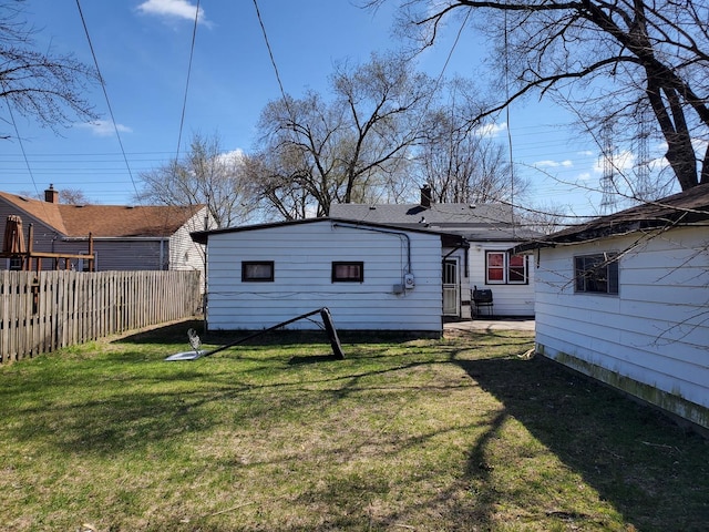 818 Campbell Ave, Calumet City, IL 60409 - rear view of property with a yard and fence