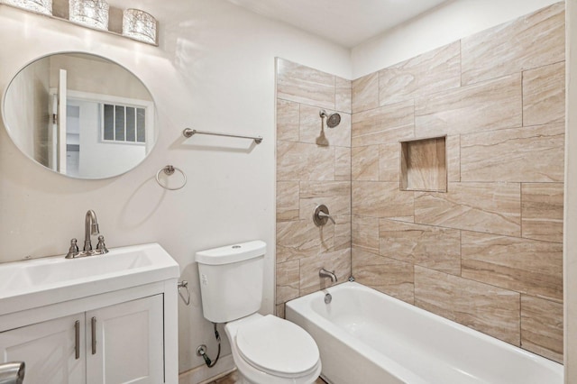 full bath featuring shower / bath combination, vanity, and toilet