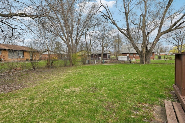 view of yard featuring fence