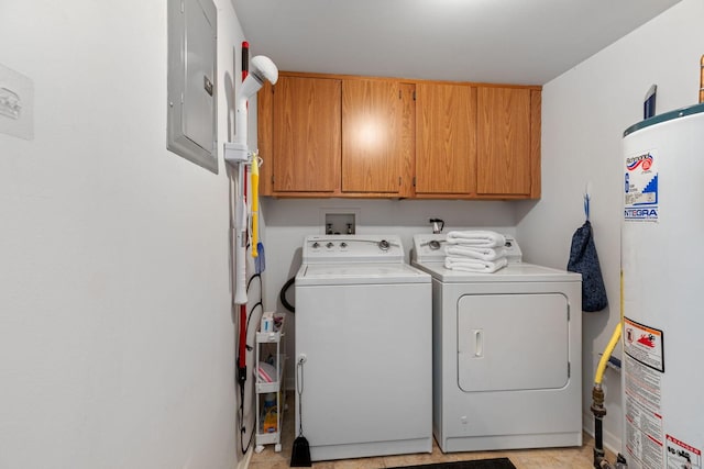 laundry room featuring cabinet space, gas water heater, electric panel, and washing machine and clothes dryer