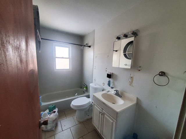 bathroom featuring tile patterned flooring, tub / shower combination, toilet, and vanity