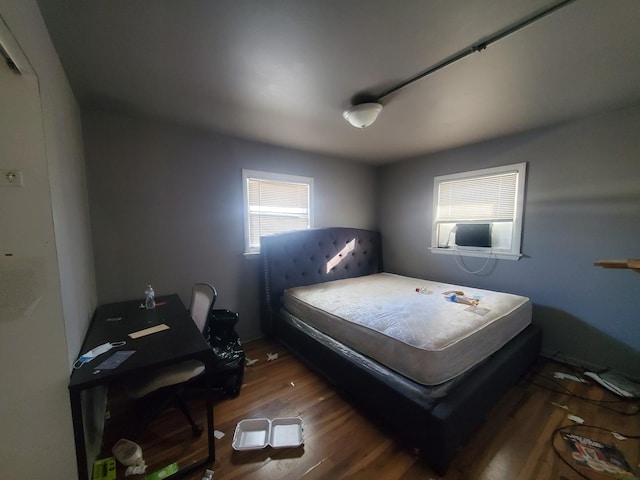 bedroom featuring wood finished floors