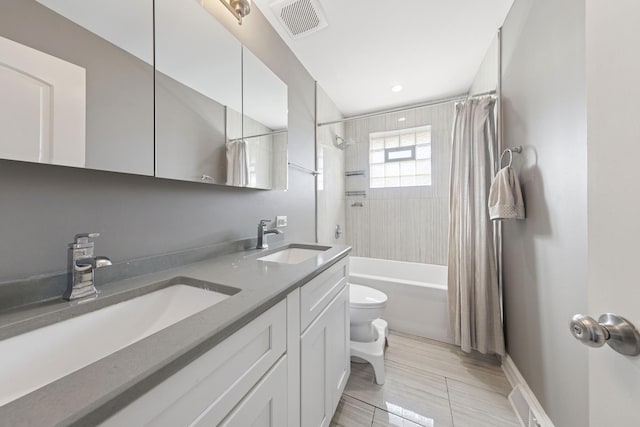 full bath with a sink, visible vents, shower / bathtub combination with curtain, and toilet