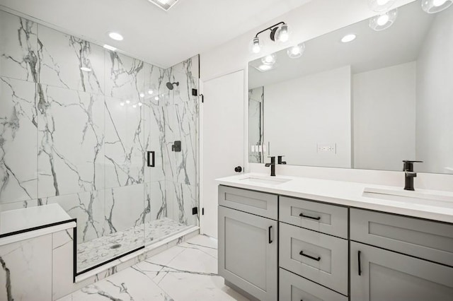 full bathroom featuring a sink, a marble finish shower, and marble finish floor