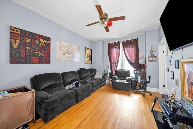 2434 W Pershing Rd, Chicago, IL 60632 - living area featuring baseboards, ceiling fan, and hardwood / wood-style floors