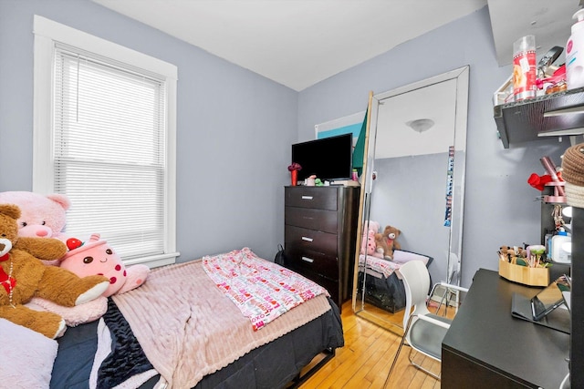 2434 W Pershing Rd, Chicago, IL 60632 - bedroom featuring light wood finished floors