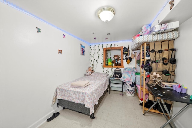 2434 W Pershing Rd, Chicago, IL 60632 - bedroom with tile patterned floors and baseboards