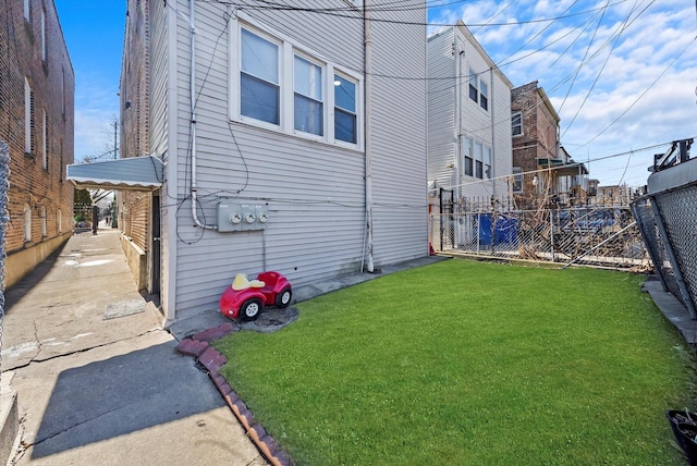 2434 W Pershing Rd, Chicago, IL 60632 - view of home's exterior with a lawn and fence