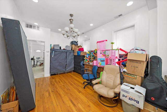 2434 W Pershing Rd, Chicago, IL 60632 - office space featuring recessed lighting, wood finished floors, visible vents, and a chandelier