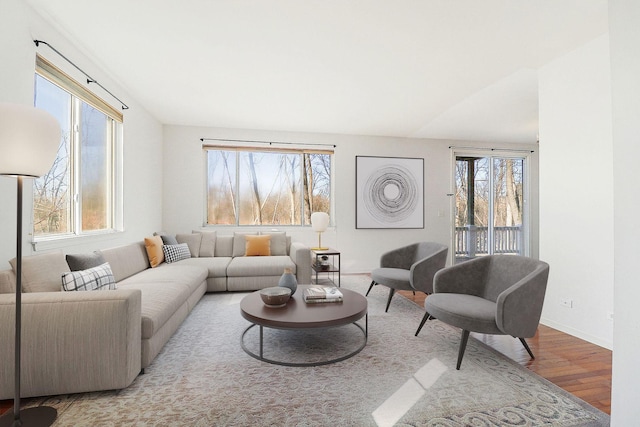 living area featuring wood finished floors and baseboards