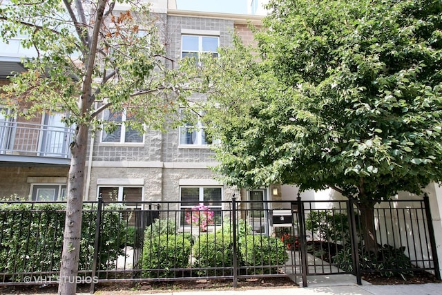 view of property with fence