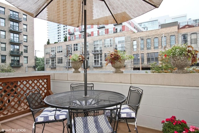 balcony featuring outdoor dining area