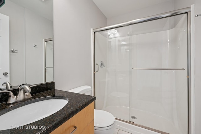 1616 S Indiana Ave Unit A2, Chicago, IL 60616 - bathroom featuring toilet, vanity, and a shower stall