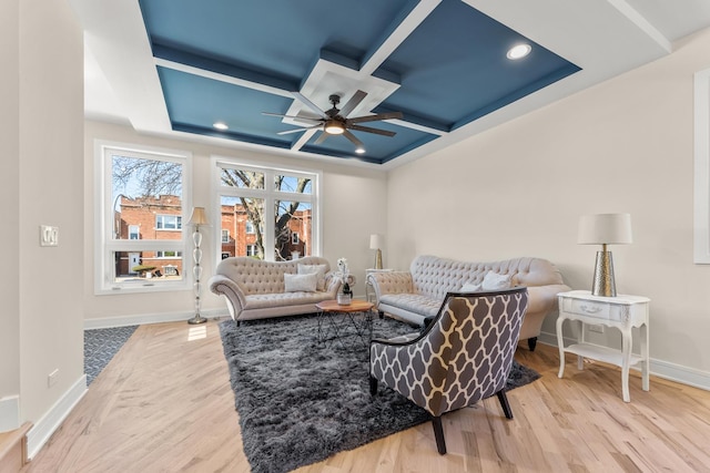 living room featuring coffered ceiling, recessed lighting, light wood-style floors, baseboards, and ceiling fan