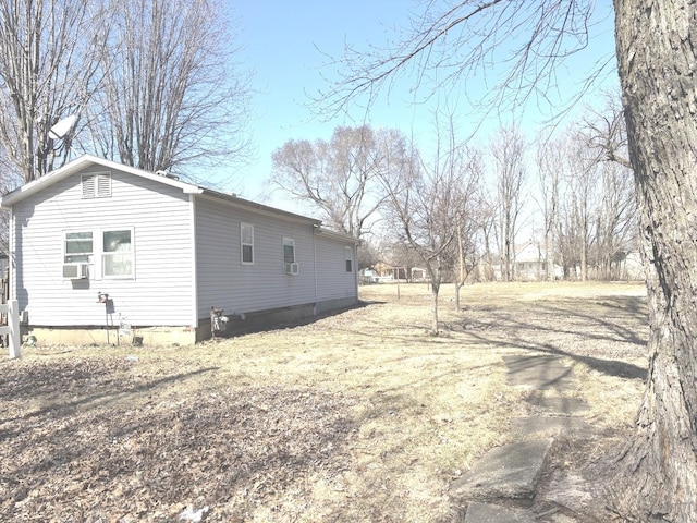 view of side of property featuring cooling unit