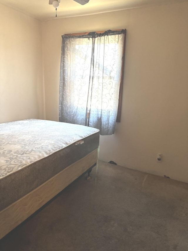 bedroom with carpet flooring and a ceiling fan